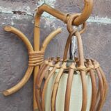 Pair of Louis Sognot rattan wall lights.