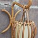 Pair of Louis Sognot rattan wall lights.