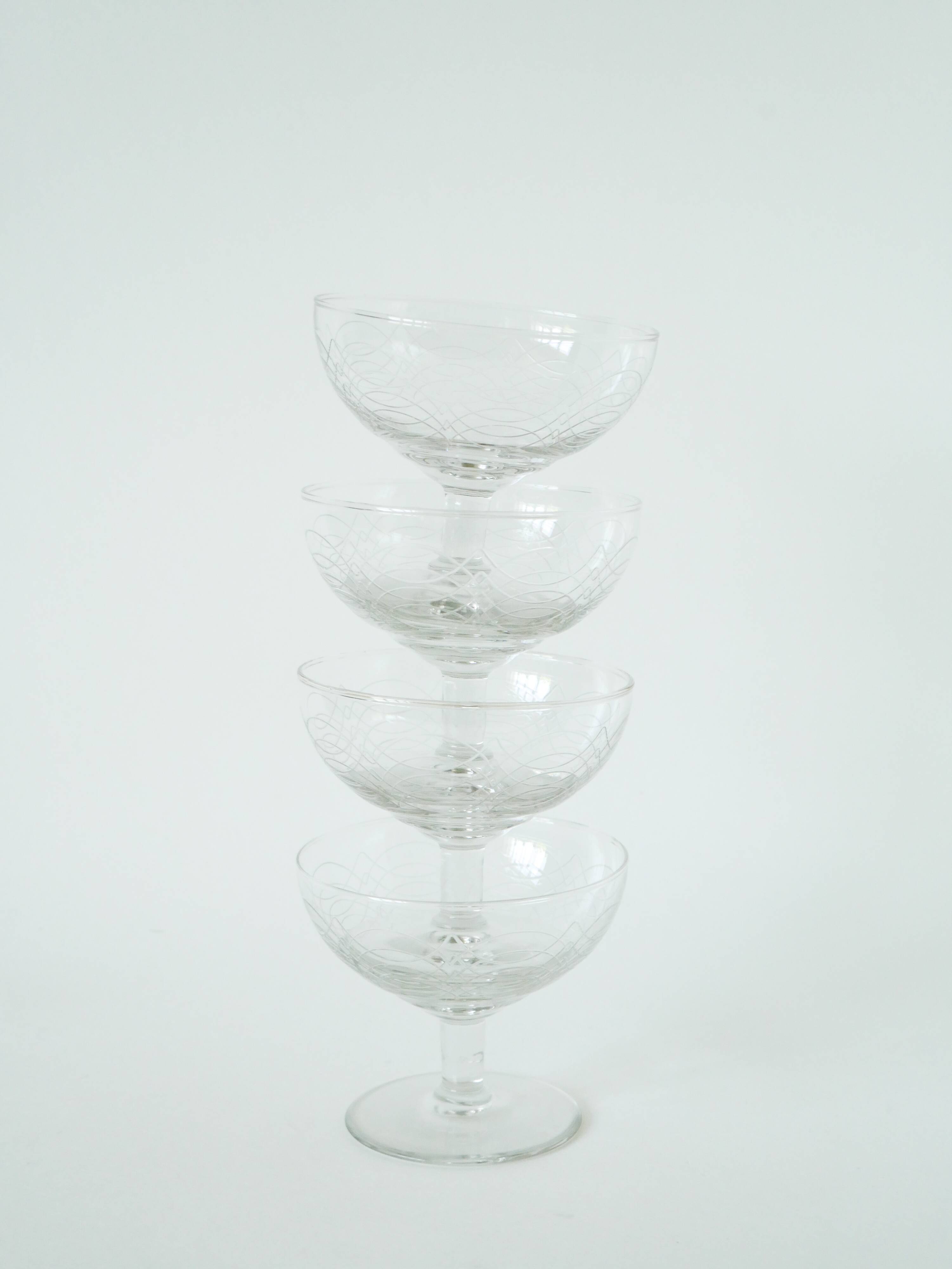 Set of 4 engraved crystal champagne glasses, arabesque motifs, 1950