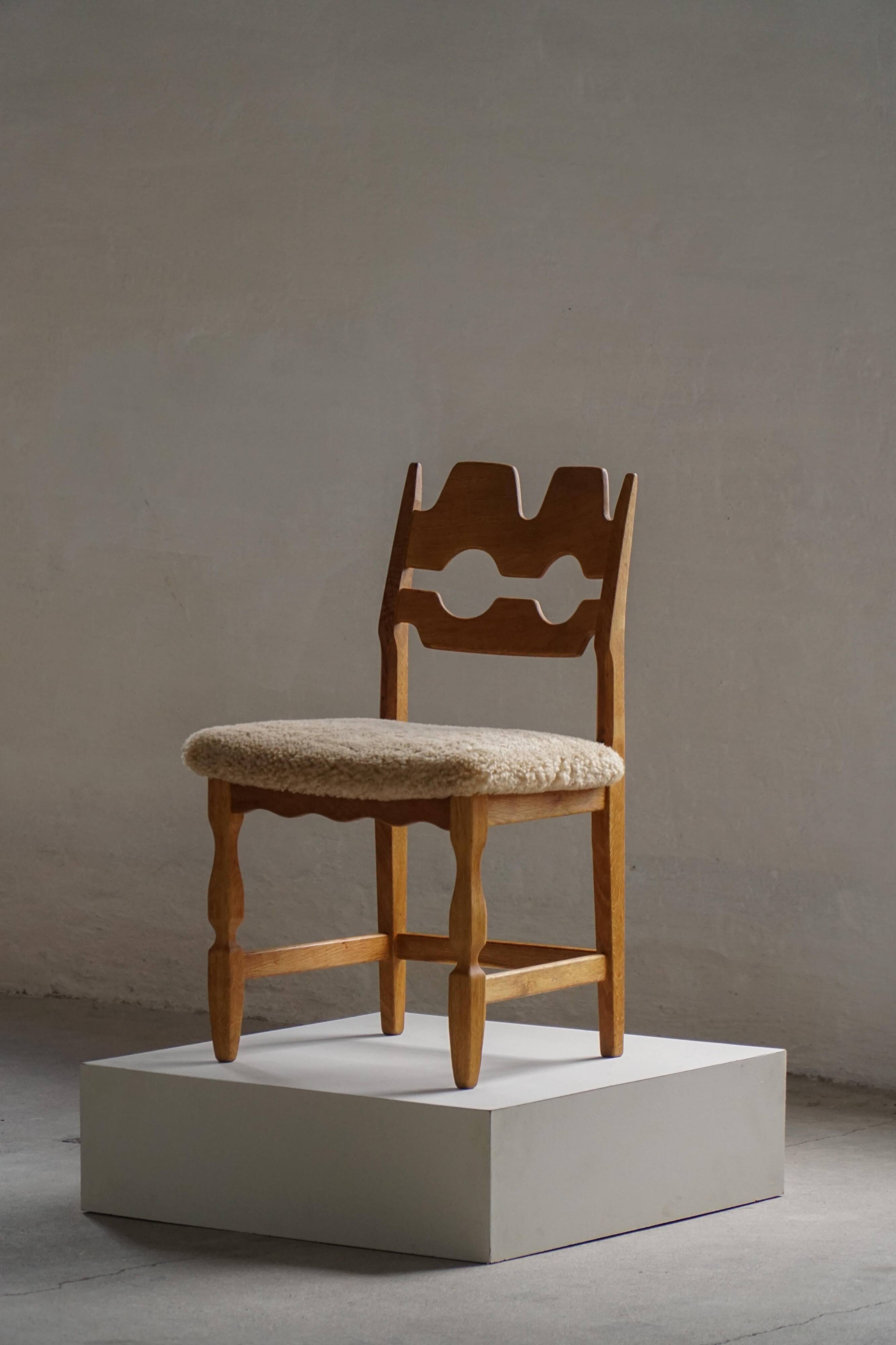 "Razorblade" dining chair by Henning Kjærnulf, in oak and lamb's wool, Denmark, 1960s.