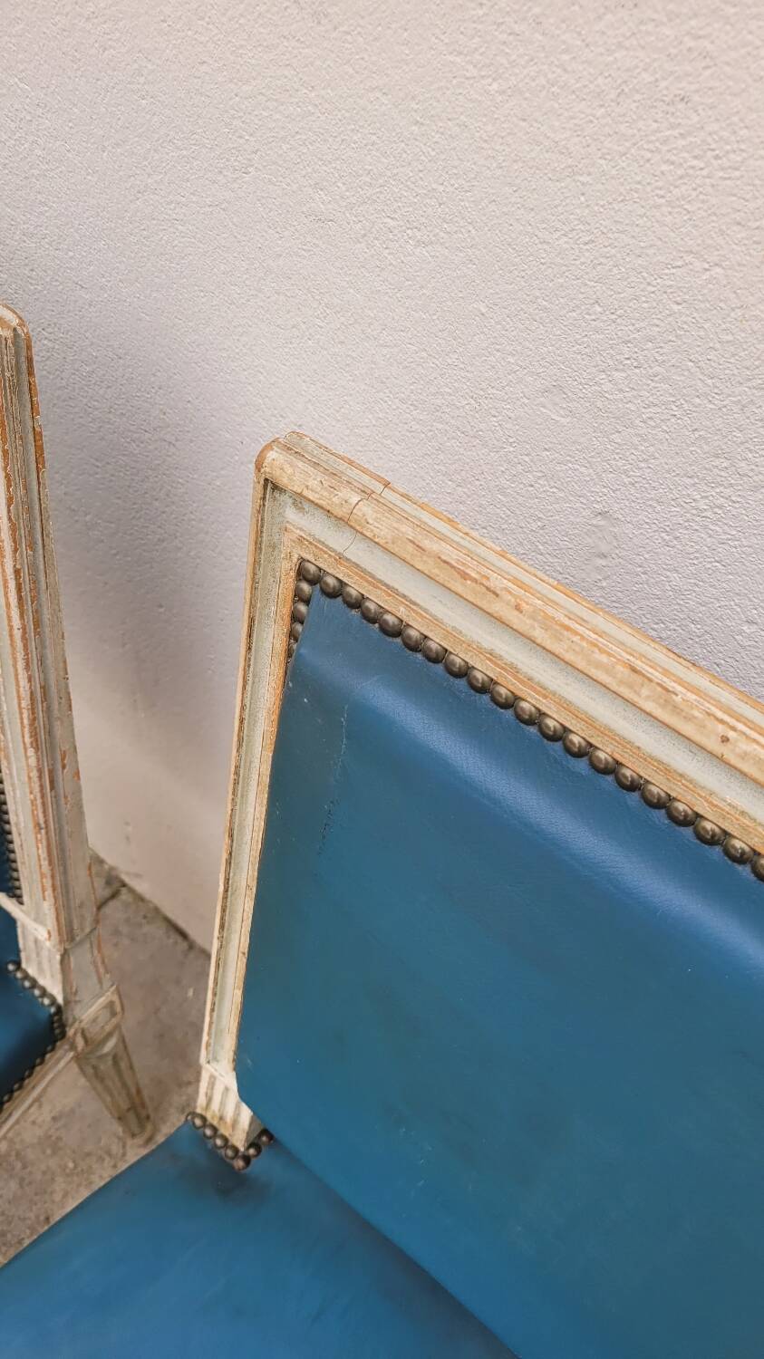 Pair of antique Louis XVI style chairs with patina