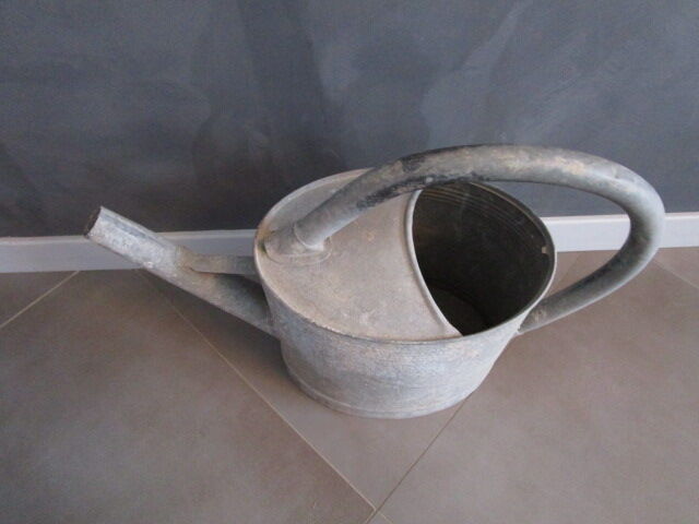 Old zinc watering can