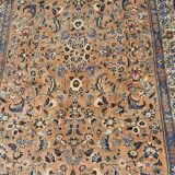 Large wool and silk oriental carpet.