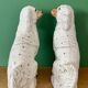 Pair of Staffordshire-type dogs in white and gold ceramic