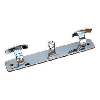 Vintage chrome wall coat rack with three hooks.
