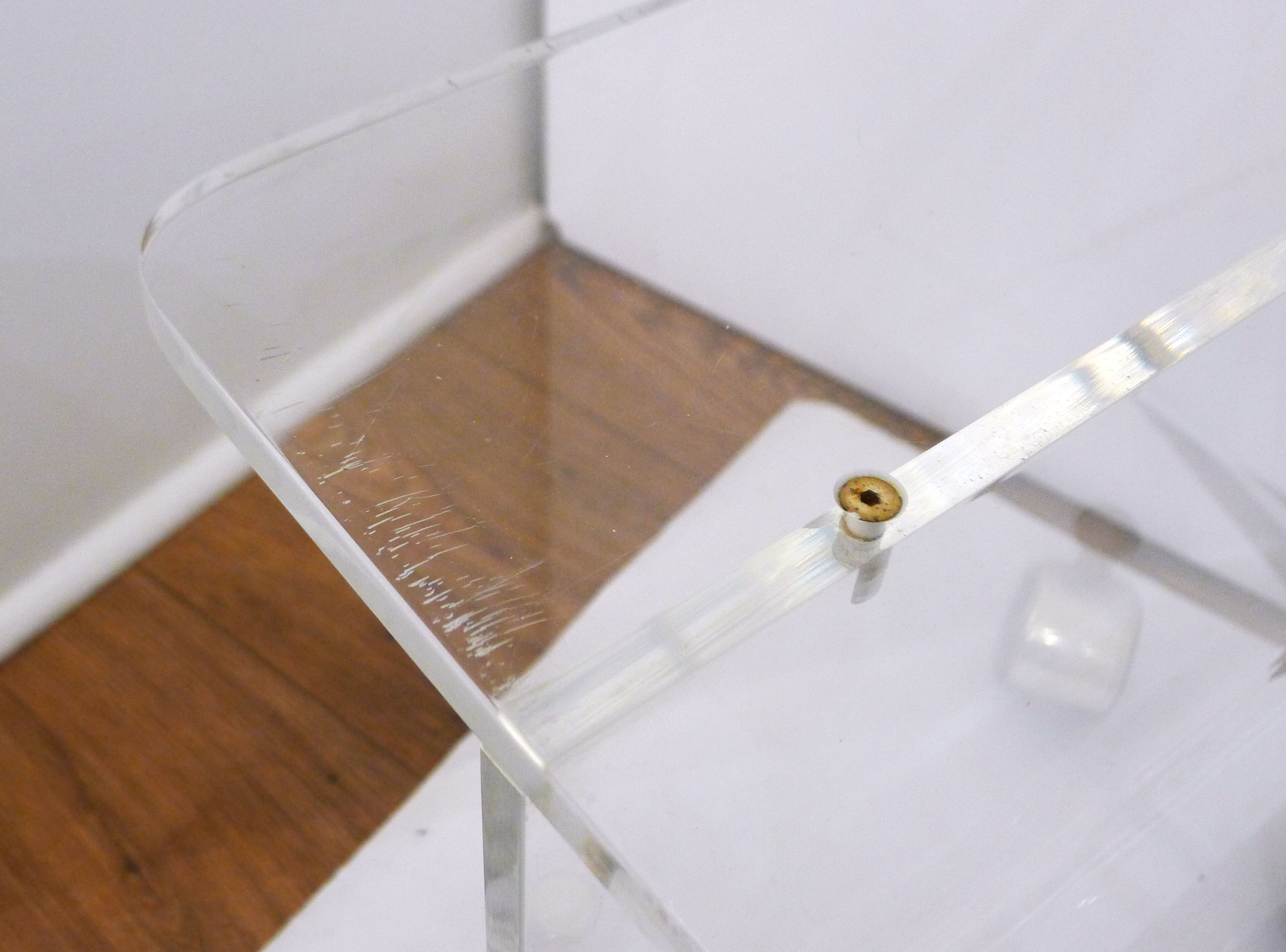 Transparent thermoformed plexi coffee table, on wheels