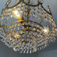 Brass chandelier with crystal pendants from the 1970s.