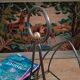 Vintage magazine rack with brass legs