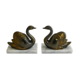 Swan bookends on marble