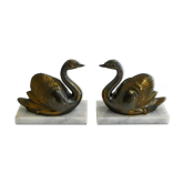 Swan bookends on marble