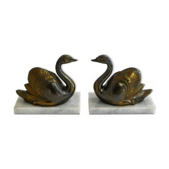 Swan bookends on marble