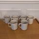 Six ceramic mugs