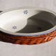 Set of 4 white porcelain dishes with blue decorations and wicker stands