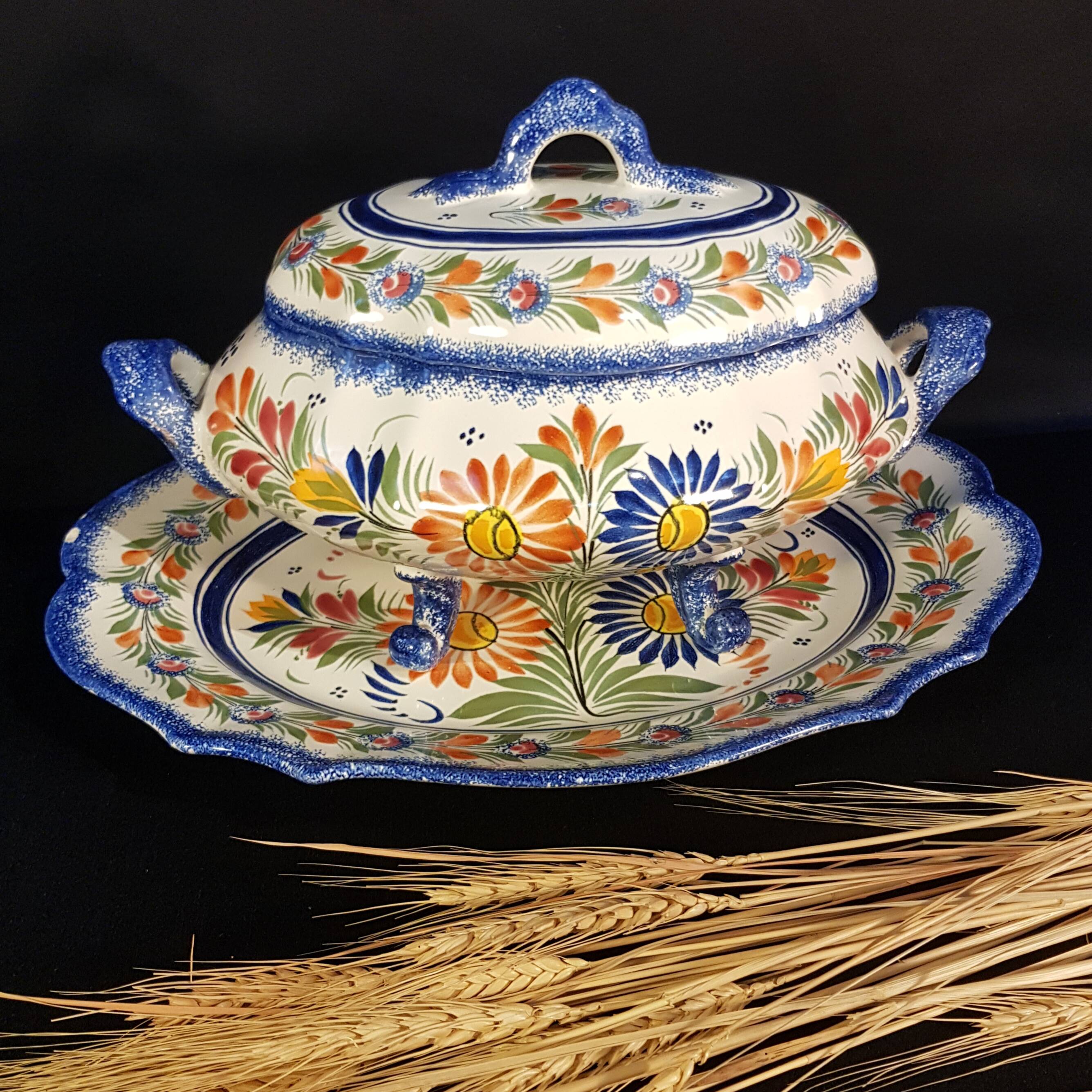 Vegetable soup tureen on Henriot Quimper display dish