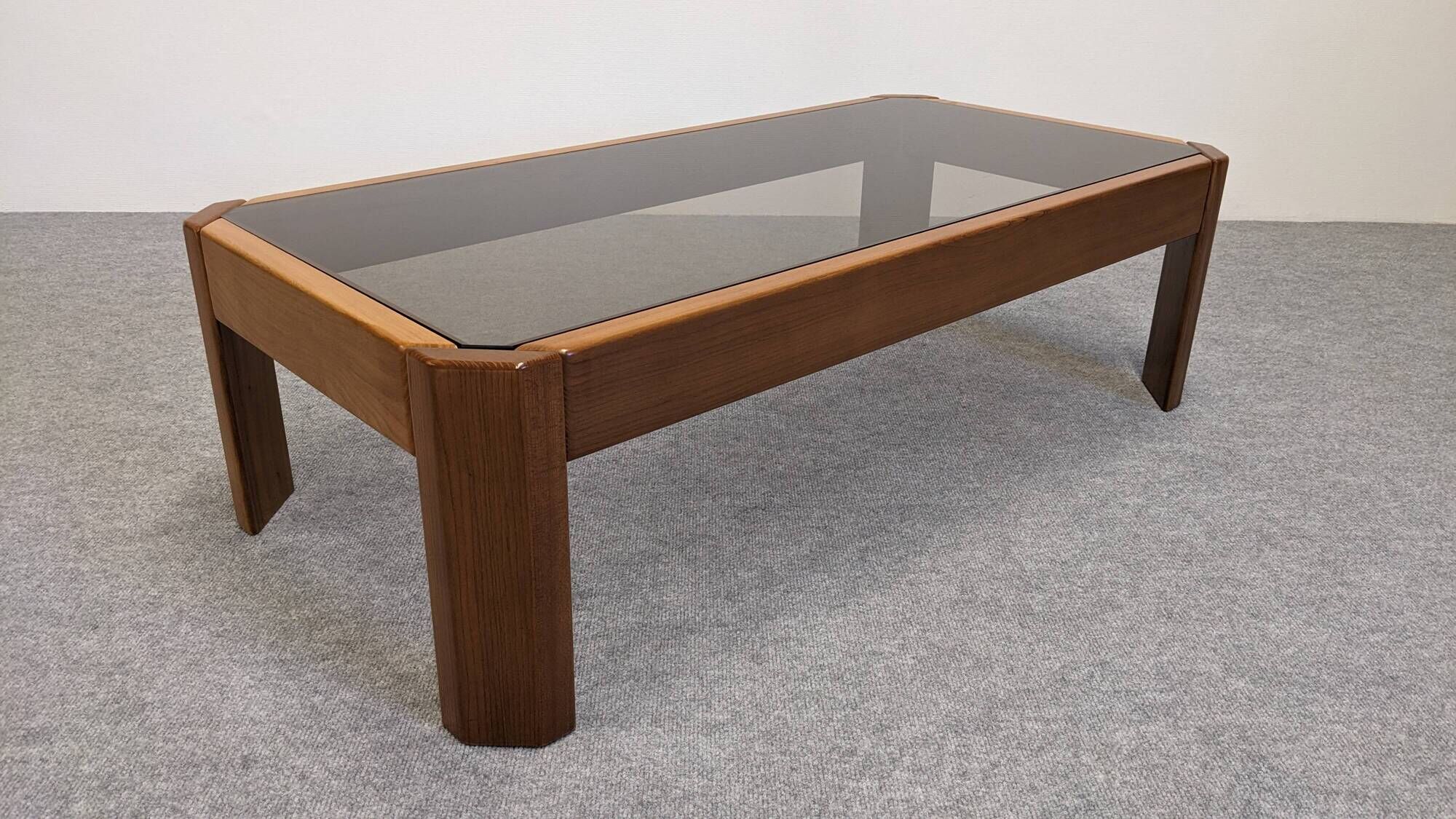 Modernist coffee table in elm and smoked glass, Italy circa 1970.