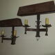 Pair of mid century patinated iron outdoor wall lights, 1960