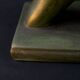 Modern sculpture of a nude woman in green ceramic, signed Carlos Nazareth