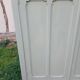 Parisian wardrobe with 2 doors and 3 shelves in Luxembourg green.