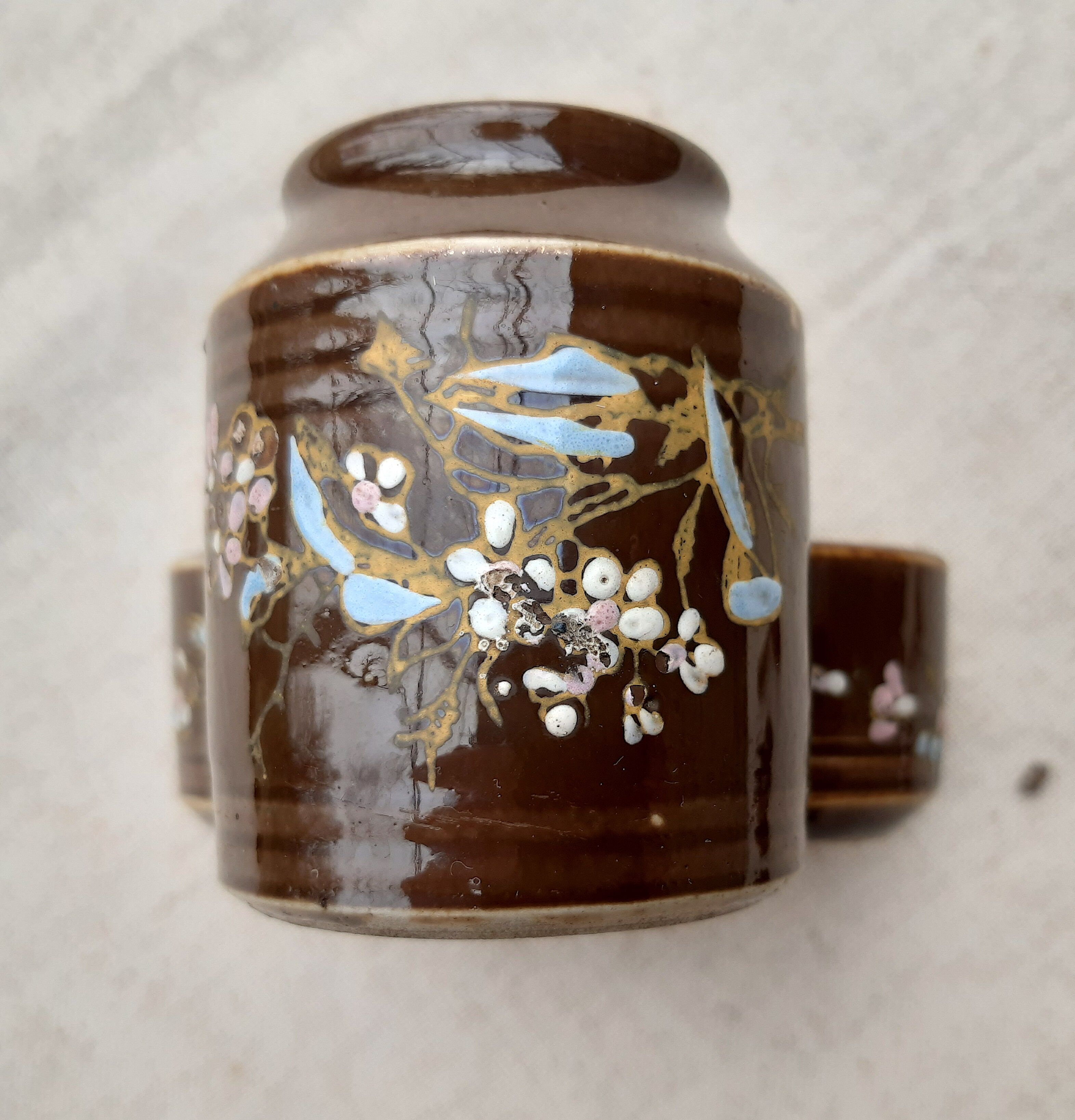 mustard with salt and pepper, brown enamelled sandstone with floral motifs