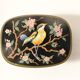 Boîte métallique vintage noire avec décor oiseaux