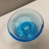 Two small candle holders in blue glass from the well-known Finnish company Ittala.