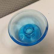 Two small candle holders in blue glass from the well-known Finnish company Ittala.