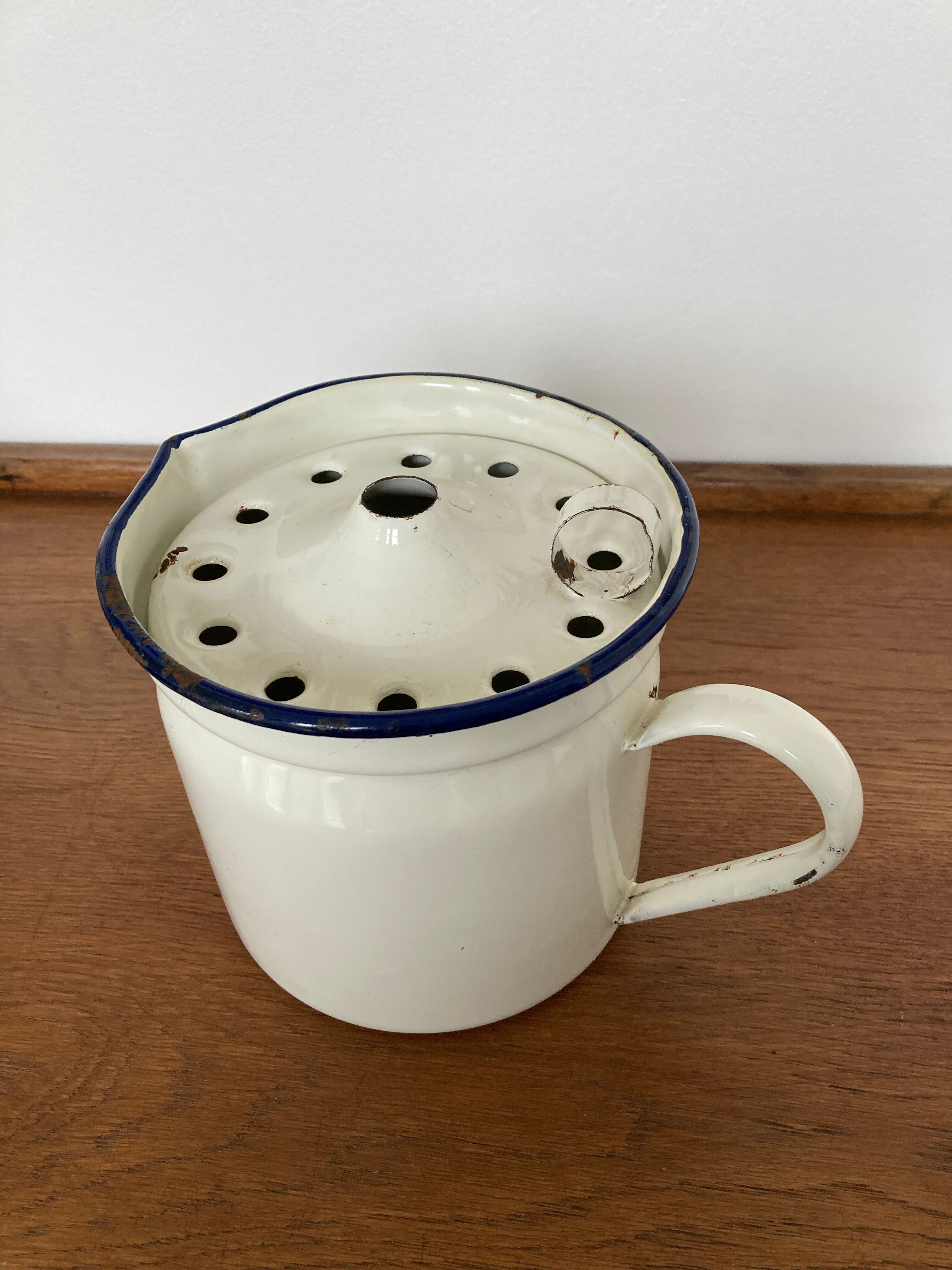 Vintage enamelled iron pitcher