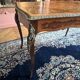 Desk, rosewood marquetry table, bronze ornaments dating from the late 19th century.