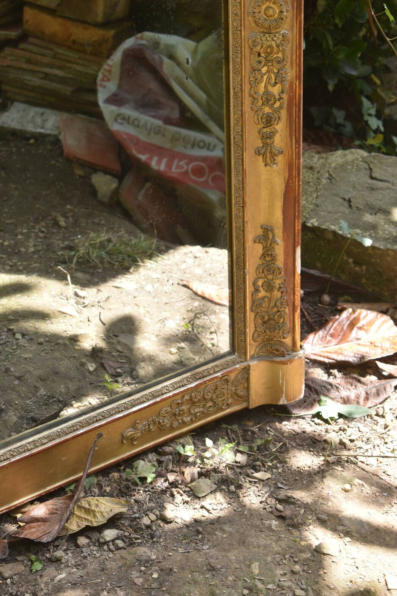 Large gilded Empire mirror from the 19th century.