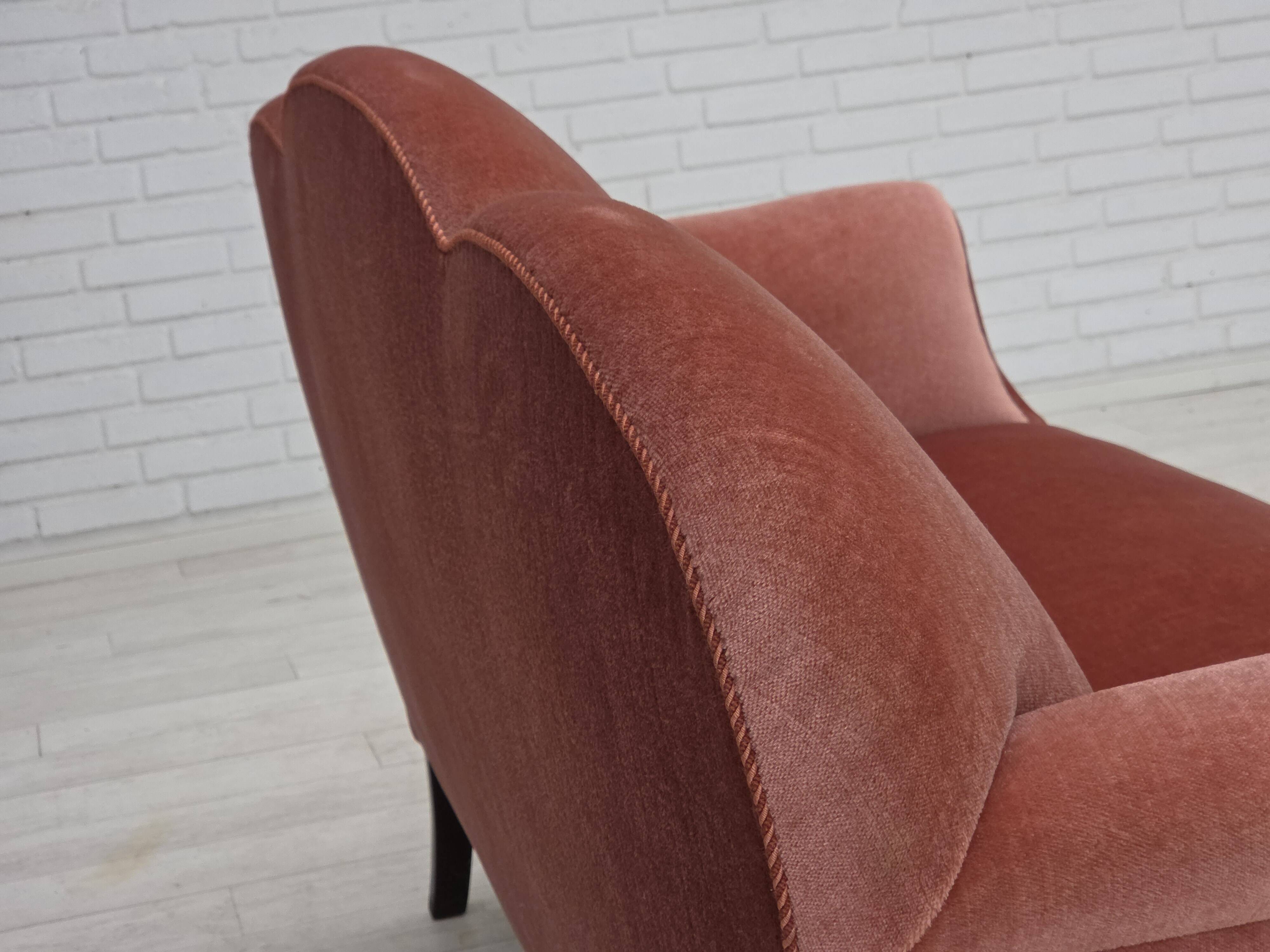 1950s, Danish 2-seater sofa, salmon pink furniture velour, oak wood legs.