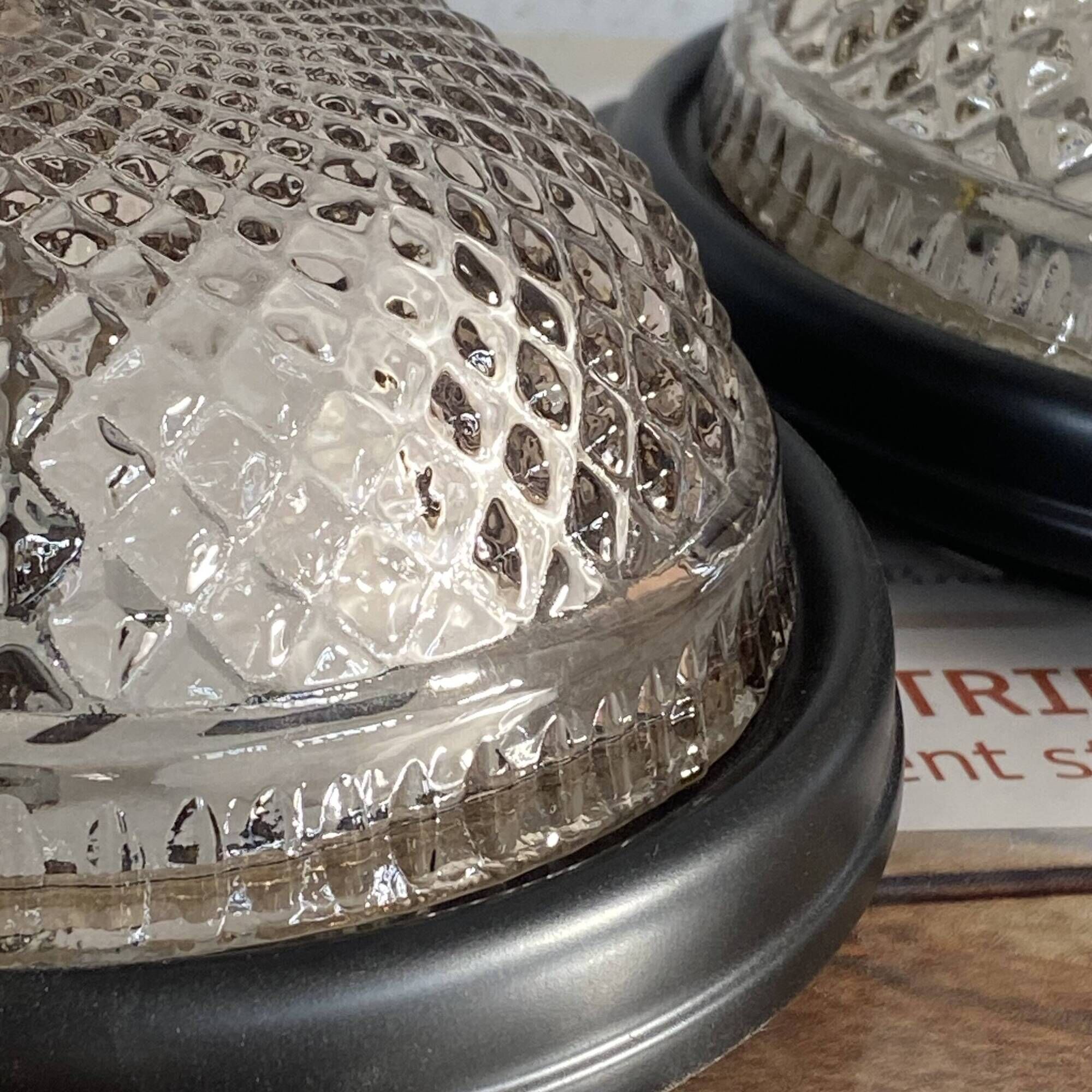 Small pair of vintage ceiling sconces in glass and black metal.