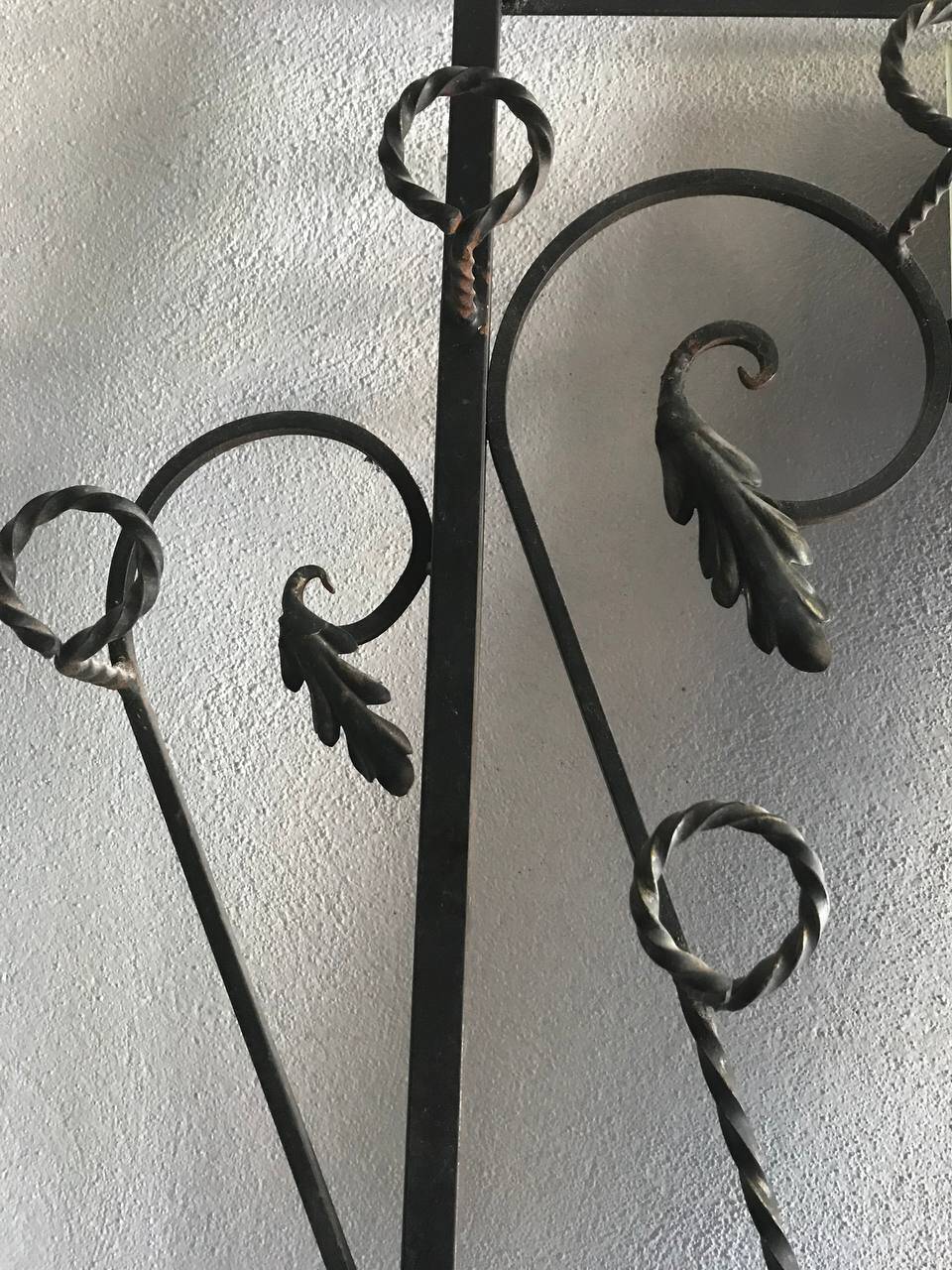Wrought iron coat rack and shelf