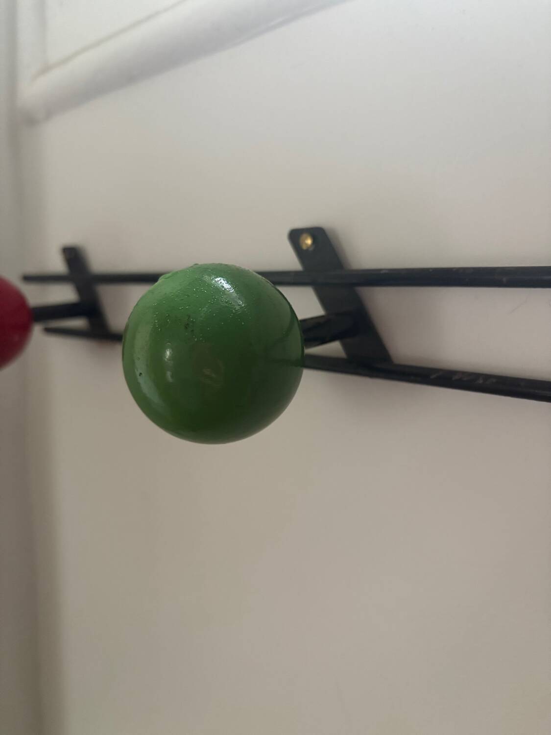 Retro coat rack with 3 red and green balls