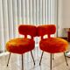 Pair of Pelfran chairs in faux orange, 1960s-70s.