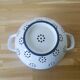 Enamelled strainer