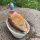 Charming Duck, slip, enameled ceramic terrine, white basket-shaped base and lid