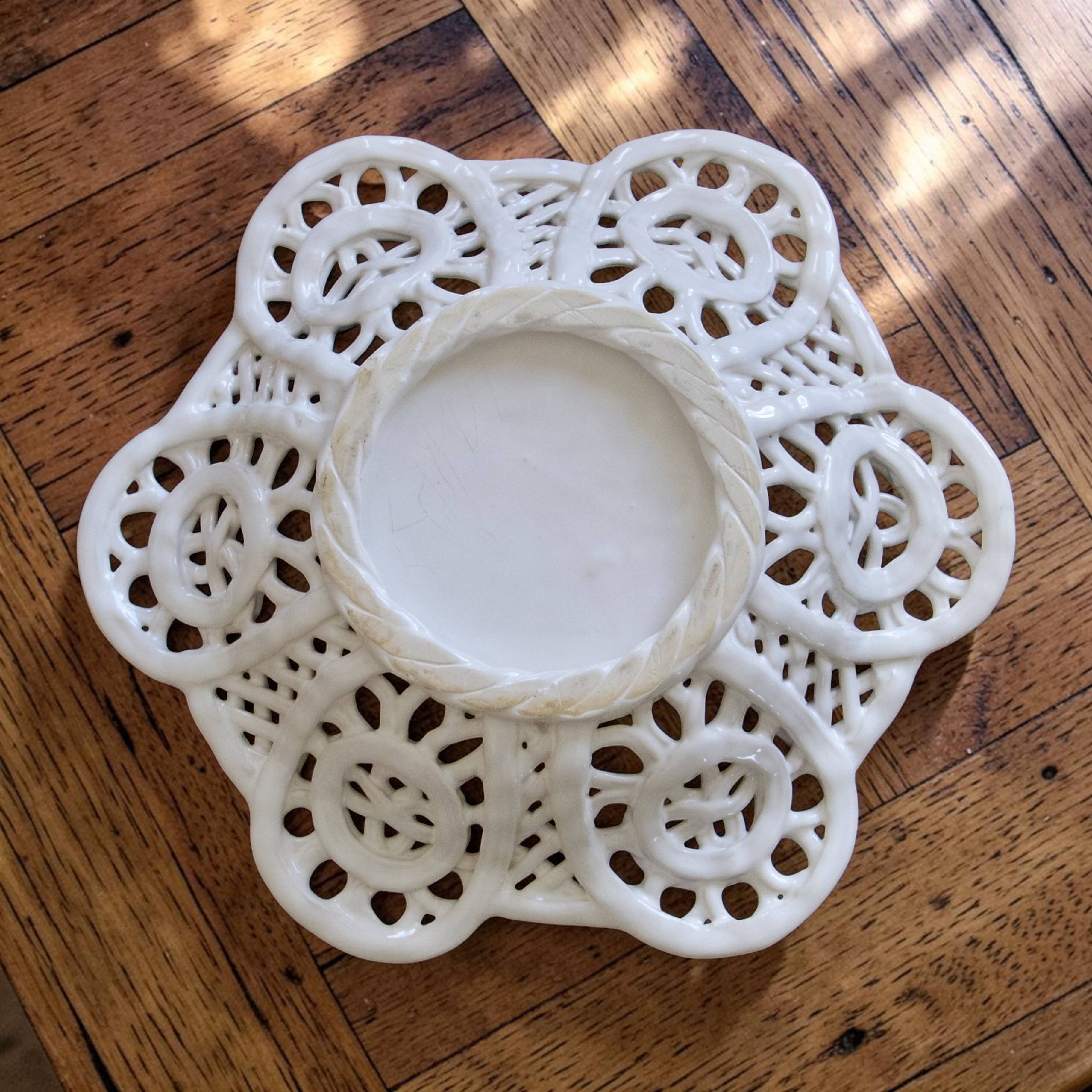 Vintage cup in openwork porcelain lace