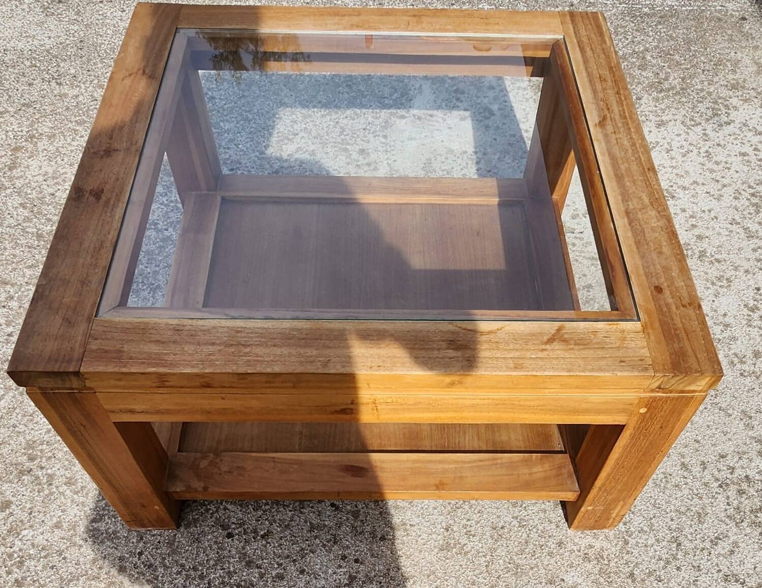 Glass coffee table in wood