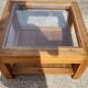 Glass coffee table in wood