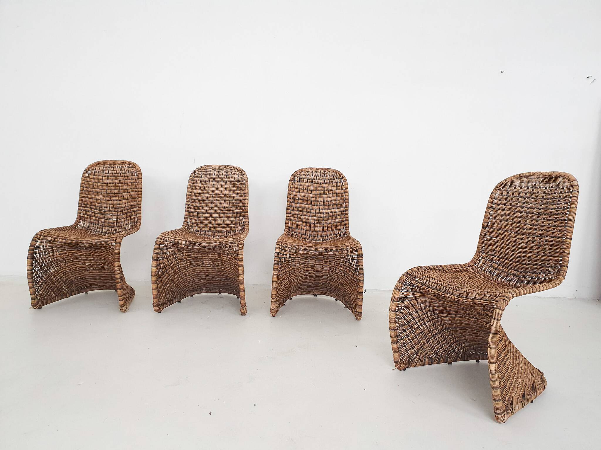 Set of four rattan S-chairs