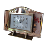 Art deco clock in pink and brass glass