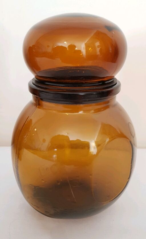 4  amber glass jars  70