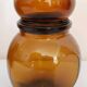 4  amber glass jars  70