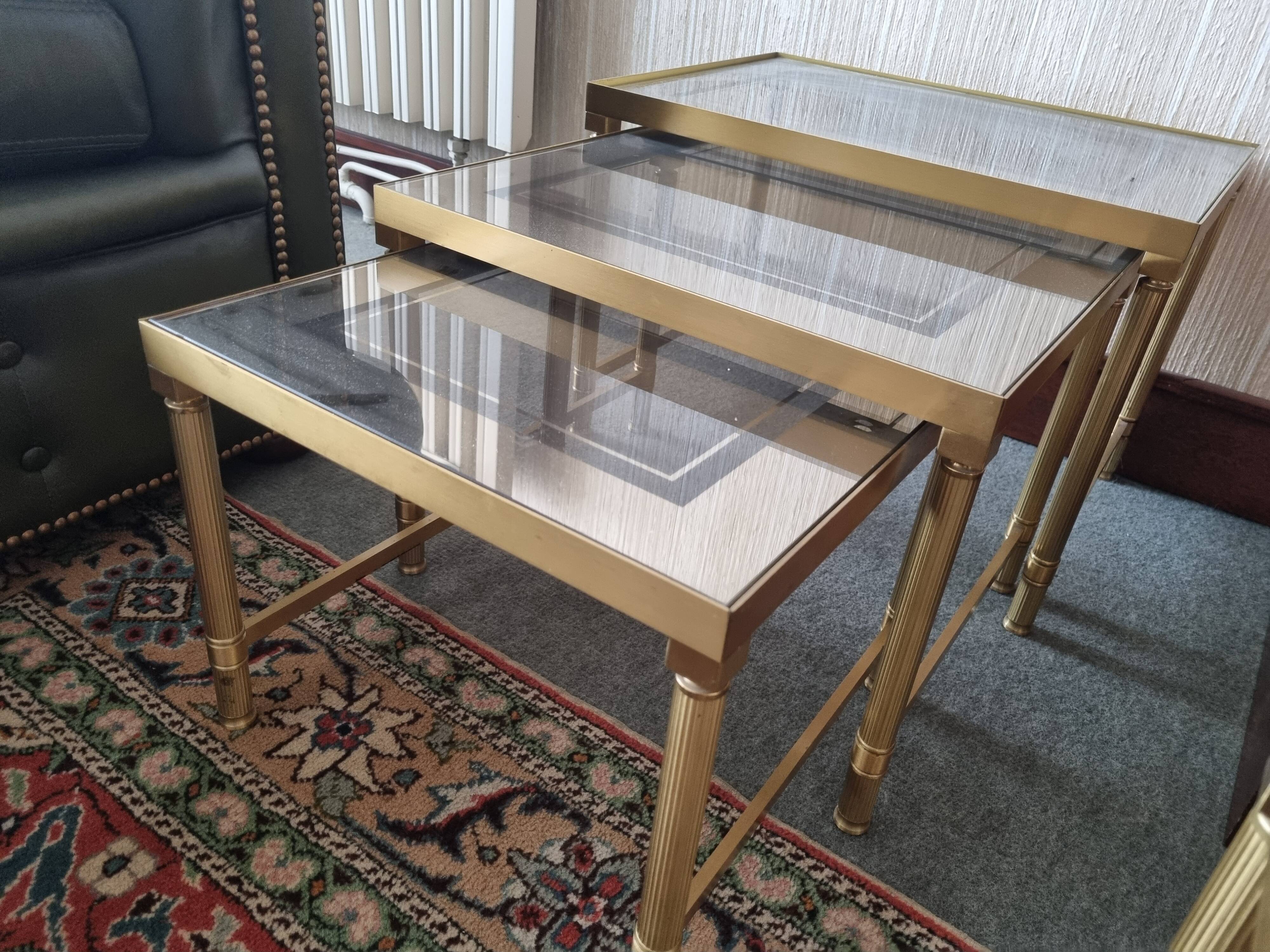 Set of three nesting tables in brass and glass