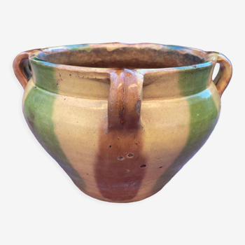 Old terracotta flower pot varnished