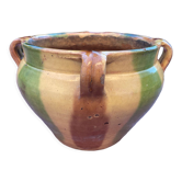 Old terracotta flower pot varnished