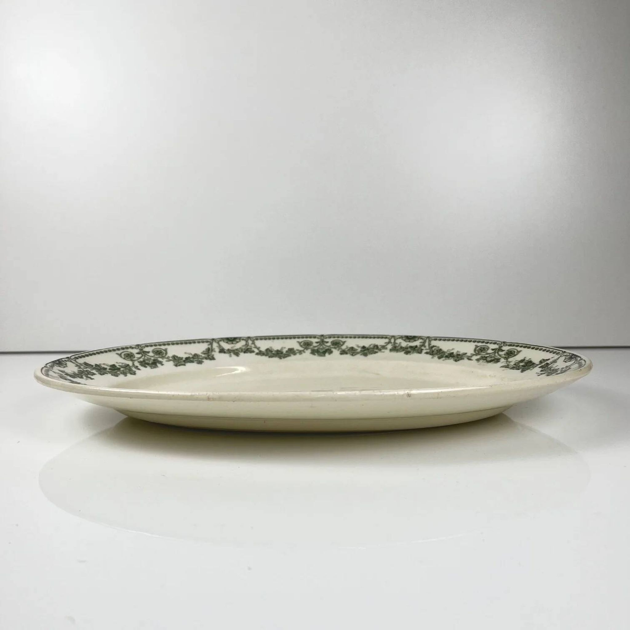 Oval plate model "Champagne", Badonviller, green