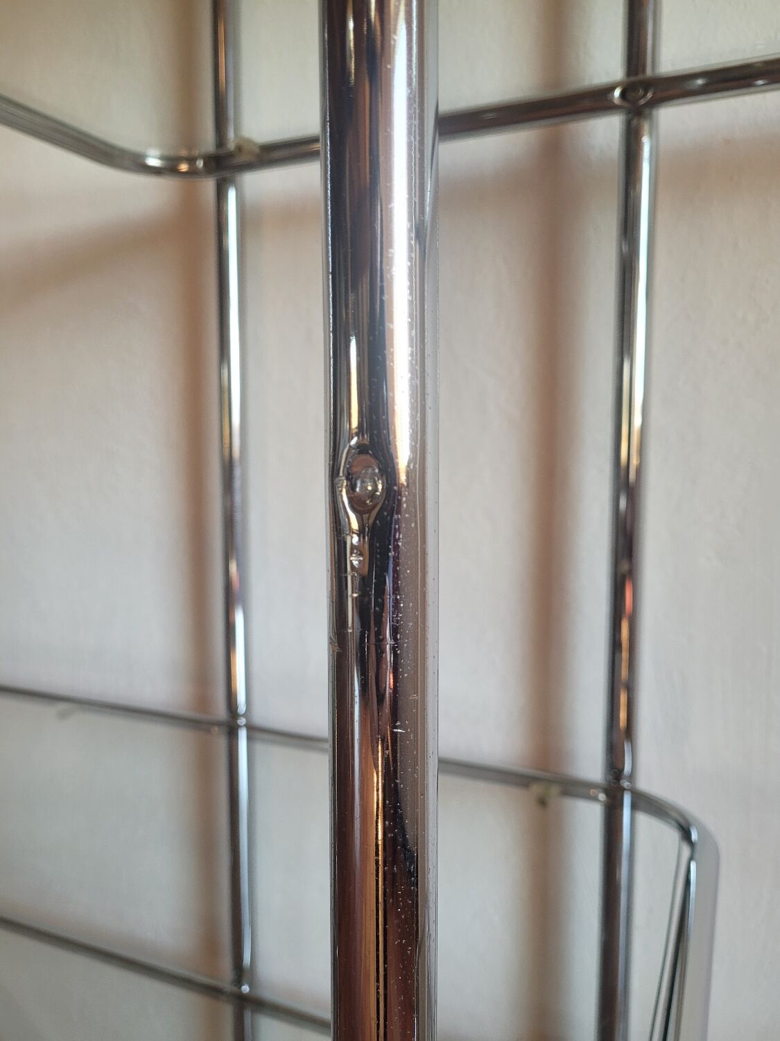 Bauhaus-style chrome round shelf