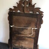 Gilded wooden pediment mirror