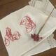 Antique white cotton pillowcase with crochet and monogram.